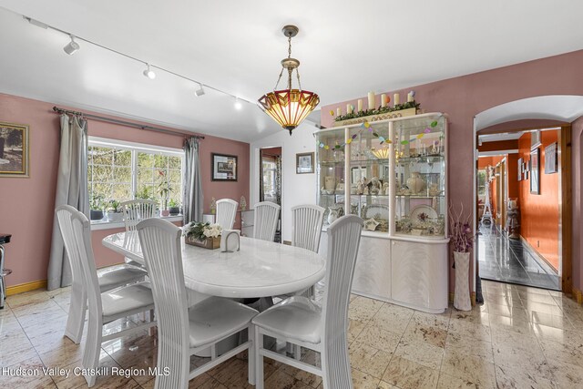 60-62 Stony Rd, Accord, NY 12404 - dining room featuring baseboards and arched walkways