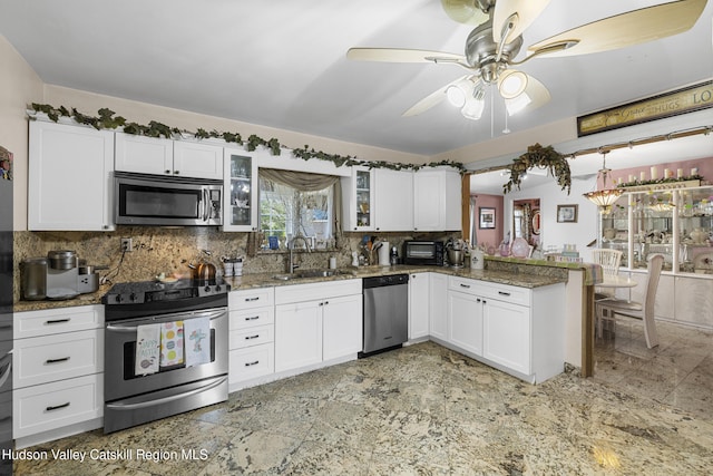 60-62 Stony Rd, Accord, NY 12404 - kitchen featuring a sink, stainless steel appliances, glass insert cabinets, dark stone countertops, and white cabinetry