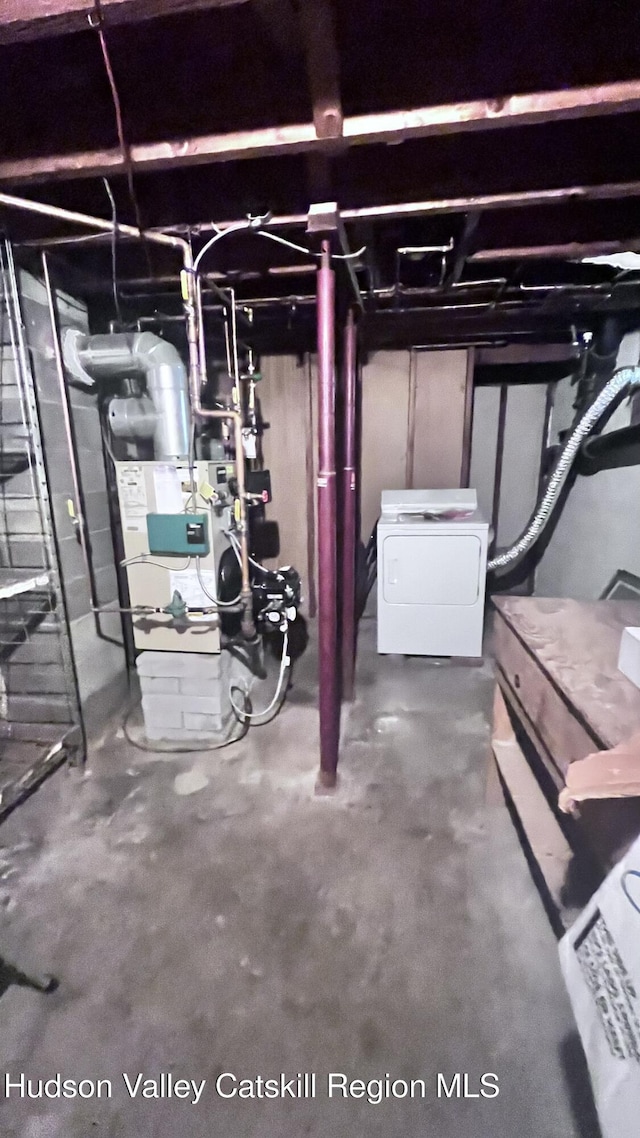 252 Rte 199, Red Hook, NY 12571 - unfinished basement with washer / dryer and a heating unit
