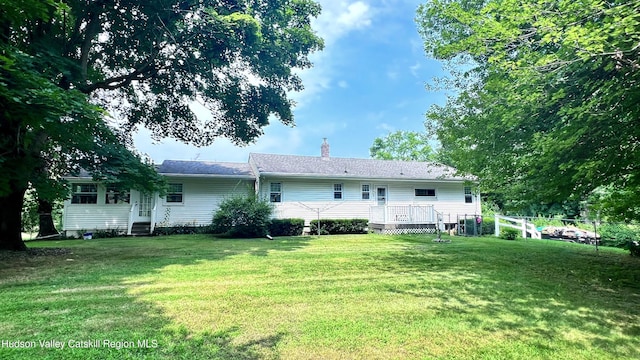 252 Rte 199, Red Hook, NY 12571 - rear view of house featuring a chimney and entry steps