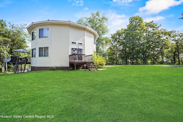 17 Boice Mill Rd, Kerhonkson, NY 12446 - back of house featuring stairs, a wooden deck, and a lawn