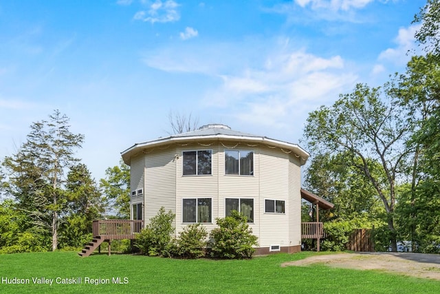 17 Boice Mill Rd, Kerhonkson, NY 12446 - rear view of house with a wooden deck, a lawn, and stairway