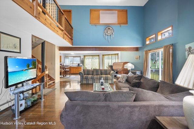 17 Boice Mill Rd, Kerhonkson, NY 12446 - living room featuring a high ceiling, stairway, and wood finished floors