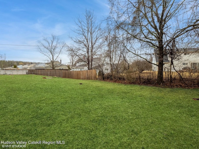 view of yard featuring fence