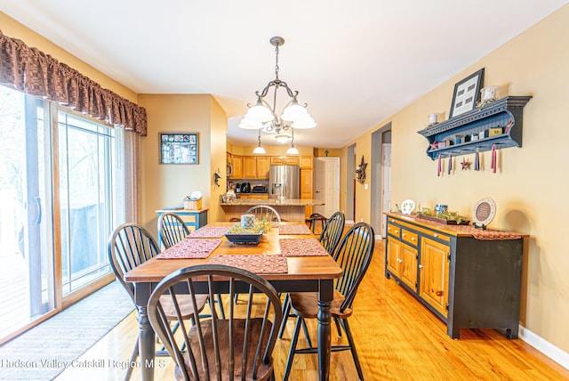 319 Garrison Woods Ln, Wallkill, NY 12589 - dining space featuring light wood-style flooring and baseboards