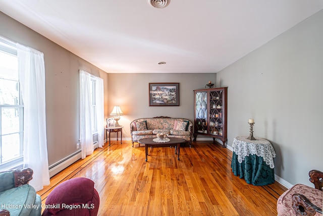 319 Garrison Woods Ln, Wallkill, NY 12589 - living area with baseboards, light wood-style flooring, and visible vents