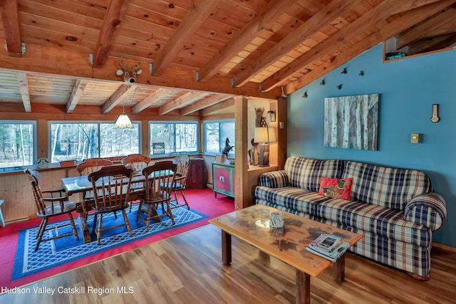 living room with plenty of natural light, wood ceiling, and hardwood / wood-style flooring