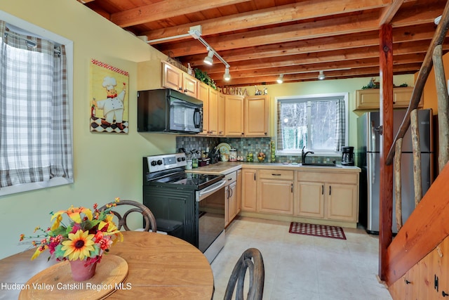 kitchen with light brown cabinets, wooden ceiling, appliances with stainless steel finishes, tasteful backsplash, and beam ceiling