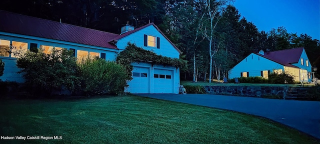 76 Smith Rd, Preston Hollow, NY 12469 - view of grassy yard featuring a garage and driveway