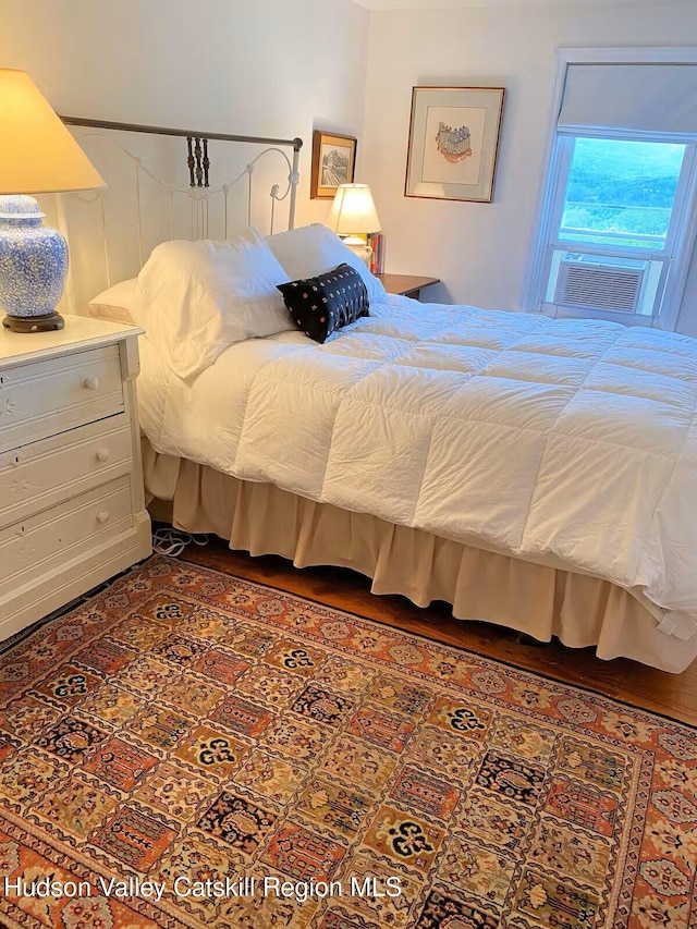 76 Smith Rd, Preston Hollow, NY 12469 - bedroom with cooling unit and wood finished floors