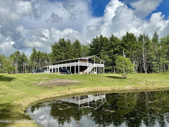 52 Bowman Rd, Chatham, NY 12037 - dock area featuring a lawn, a water view, and a view of trees