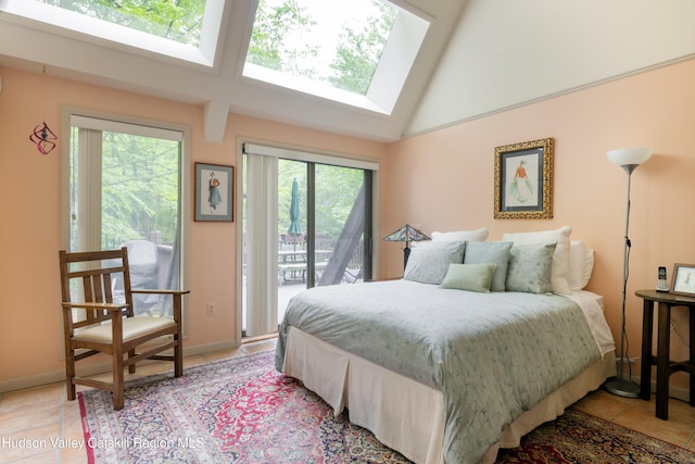494 Edwards Rd, Monticello, NY 12701 - bedroom with access to exterior, a skylight, light tile patterned floors, and high vaulted ceiling