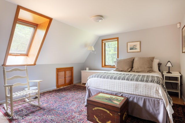 494 Edwards Rd, Monticello, NY 12701 - bedroom featuring baseboards, lofted ceiling, and carpet floors