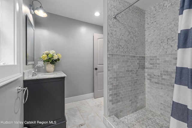 bathroom with vanity and curtained shower