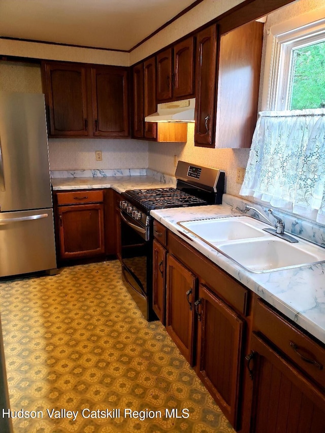 22 Katzman Rd, Ellenville, NY 12428 - kitchen with appliances with stainless steel finishes, a sink, extractor fan, light countertops, and light flooring