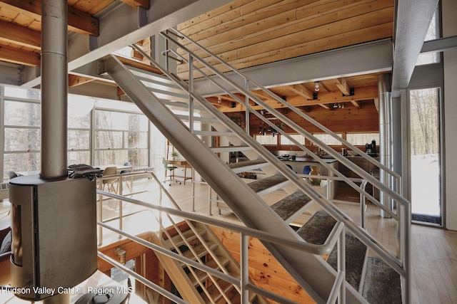 stairway featuring hardwood / wood-style flooring