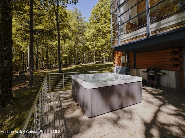 39 Hornbeck Ln, Accord, NY 12404 - wooden deck featuring a hot tub, area for grilling, a view of trees, and a patio area