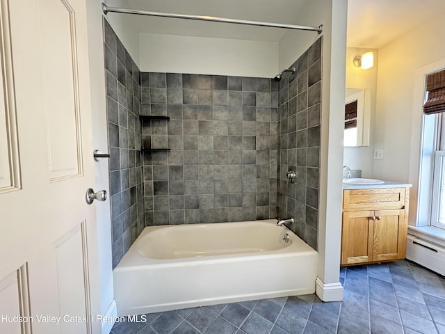 11 W Bridge St, Saugerties, NY 12477 - bathroom featuring tub / shower combination, vanity, and tile patterned flooring