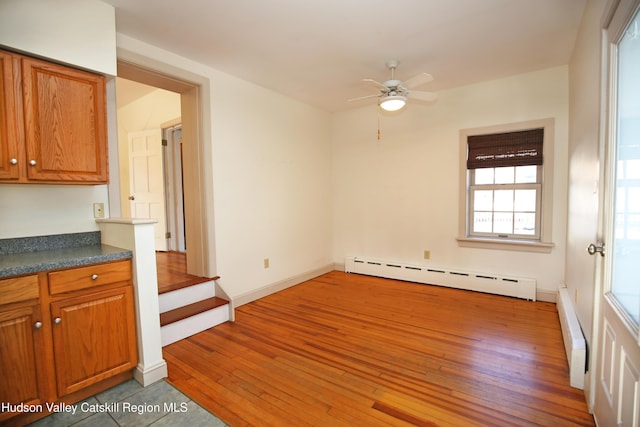 11 W Bridge St, Saugerties, NY 12477 - spare room with baseboard heating and light wood-style flooring