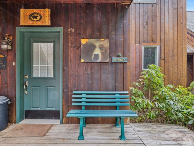 property entrance with board and batten siding