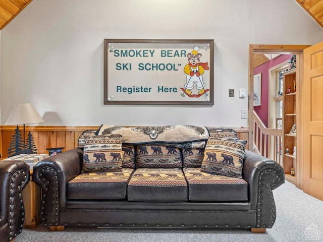 living room with vaulted ceiling, carpet floors, and wooden ceiling