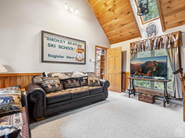carpeted living area featuring high vaulted ceiling and wooden ceiling