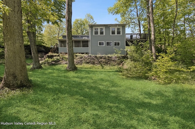194 High Falls Rd, Saugerties, NY 12477 - back of property featuring a sunroom, a lawn, and a wooden deck