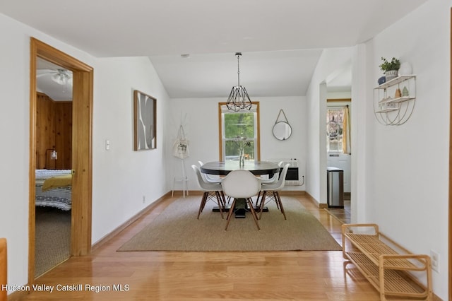 194 High Falls Rd, Saugerties, NY 12477 - dining space featuring heating unit, light wood finished floors, vaulted ceiling, and baseboards