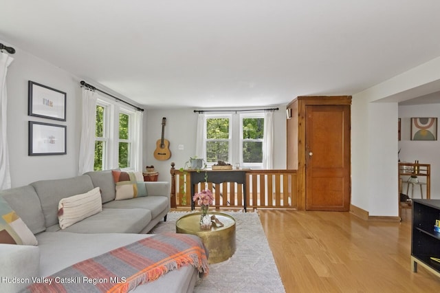 194 High Falls Rd, Saugerties, NY 12477 - living area featuring light wood-style flooring, plenty of natural light, and baseboards