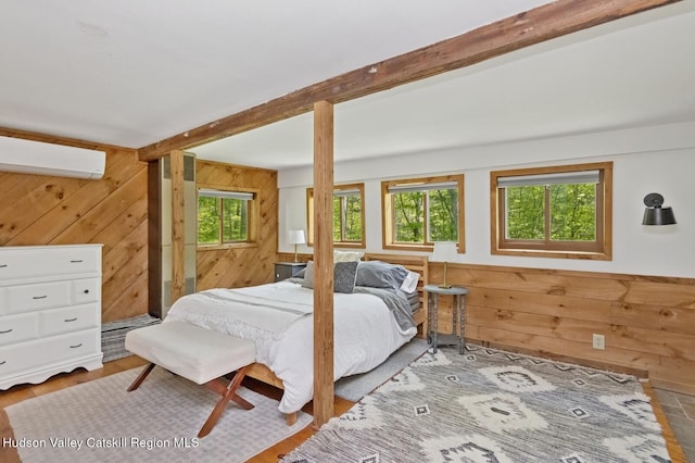 194 High Falls Rd, Saugerties, NY 12477 - bedroom with wood walls, a wall unit AC, and beamed ceiling