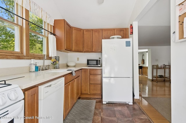 194 High Falls Rd, Saugerties, NY 12477 - kitchen with white appliances, a sink, light countertops, and brown cabinets