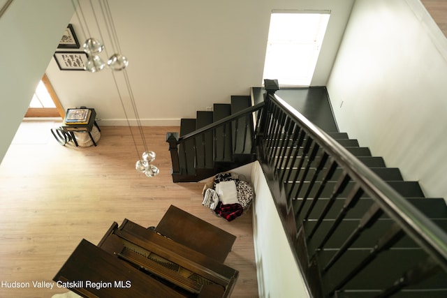 394 Macmore Rd, Roxbury, NY 12474 - stairway featuring healthy amount of natural light, wood finished floors, and baseboards