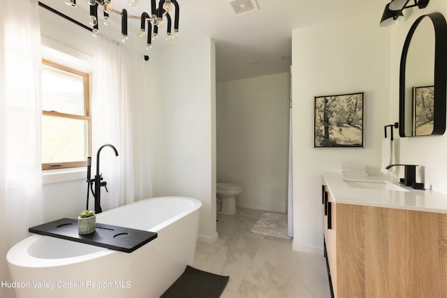 394 Macmore Rd, Roxbury, NY 12474 - bathroom with vanity, a soaking tub, marble finish flooring, toilet, and a chandelier