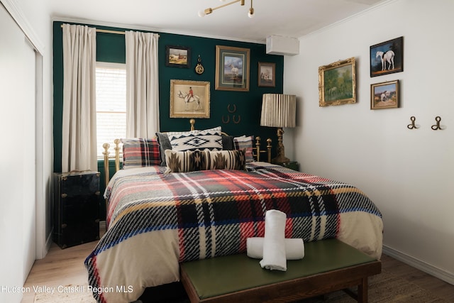 394 Macmore Rd, Roxbury, NY 12474 - bedroom with light wood-style flooring and ornamental molding