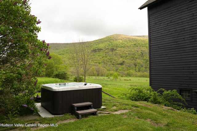 394 Macmore Rd, Roxbury, NY 12474 - view of yard with a hot tub, a mountain view, and a forest view