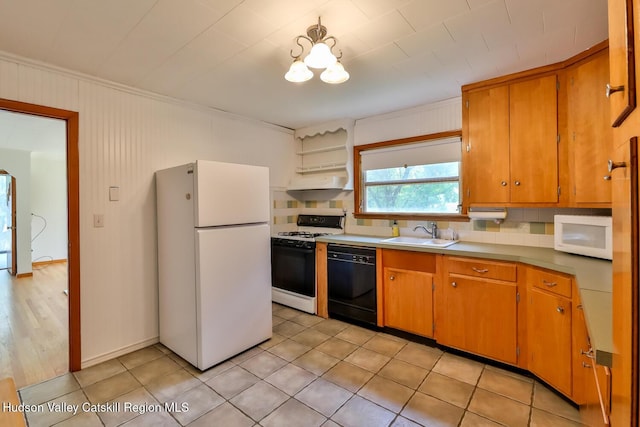 18 Maplewood Ave, Windham, NY 12496 - kitchen with white appliances, crown molding, under cabinet range hood, brown cabinets, and open shelves
