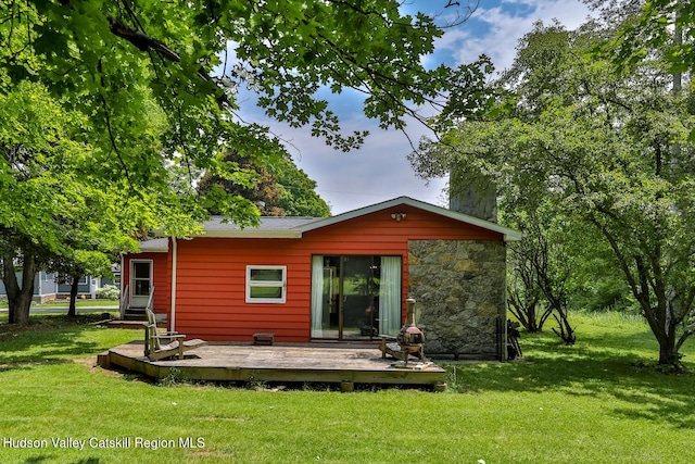 18 Maplewood Ave, Windham, NY 12496 - rear view of property with a wooden deck and a yard