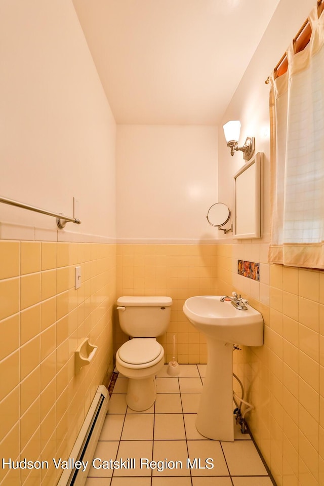 18 Maplewood Ave, Windham, NY 12496 - half bathroom with wainscoting, tile patterned floors, and tile walls
