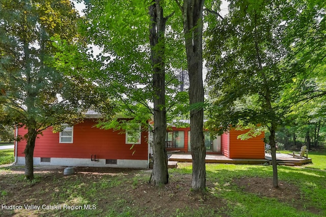 18 Maplewood Ave, Windham, NY 12496 - view of side of home featuring a deck and a lawn