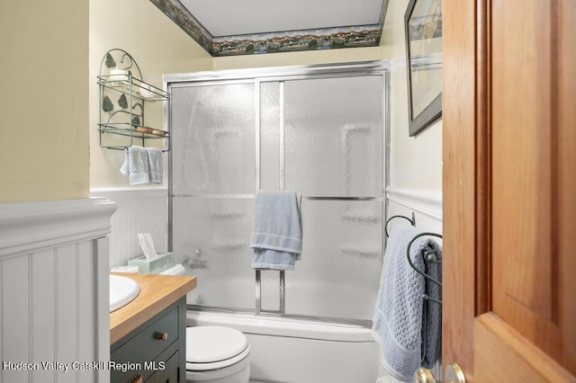 1024 Lakeview Rd, Copake, NY 12516 - full bathroom with combined bath / shower with glass door, vanity, a decorative wall, and a wainscoted wall