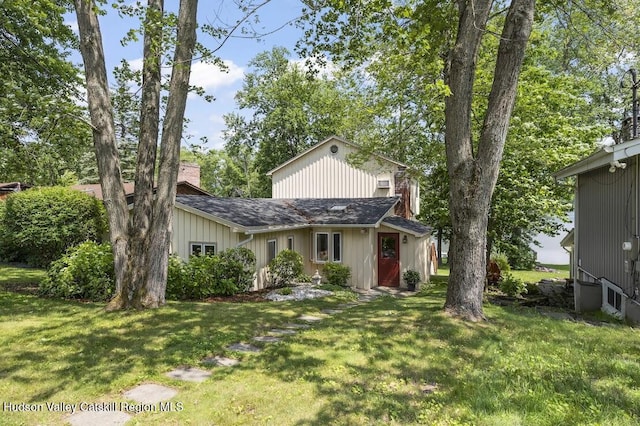 1024 Lakeview Rd, Copake, NY 12516 - traditional home with a front lawn and a chimney