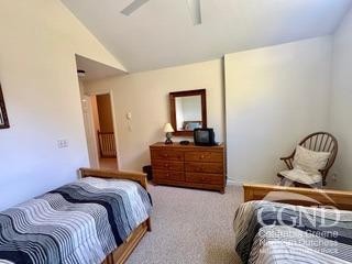 274 Brooksburgh Rd Unit 41, Windham, NY 12496 - carpeted bedroom featuring vaulted ceiling and ceiling fan