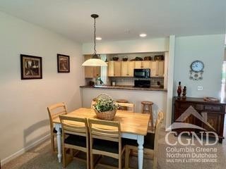 274 Brooksburgh Rd Unit 41, Windham, NY 12496 - dining area with baseboards