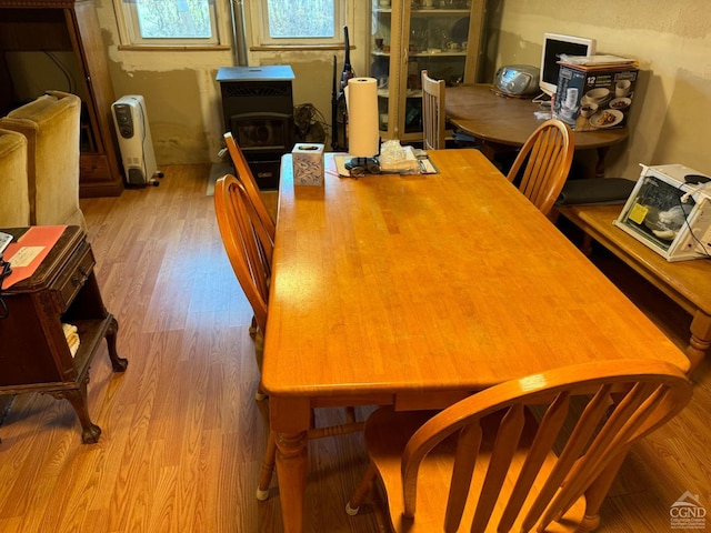 122 Bull Hill Rd, Conesville, NY 12076 - dining space featuring a wood stove and wood finished floors