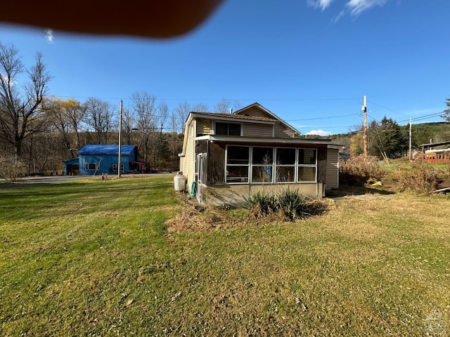 122 Bull Hill Rd, Conesville, NY 12076 - view of side of property with a lawn