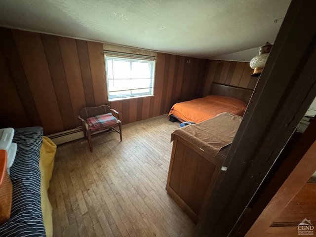 122 Bull Hill Rd, Conesville, NY 12076 - bedroom featuring wood walls and wood-type flooring