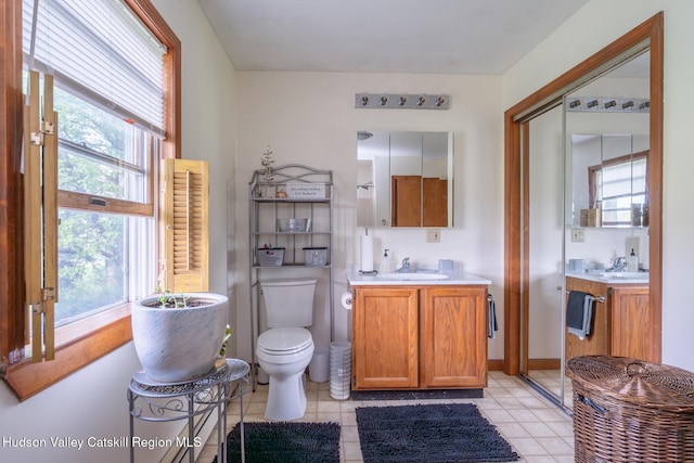 16 Fording Place Rd, Lake Katrine, NY 12449 - bathroom with tile patterned floors, vanity, and toilet