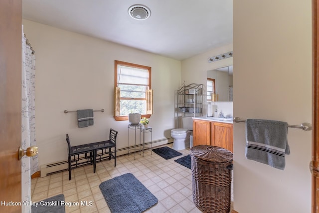16 Fording Place Rd, Lake Katrine, NY 12449 - bathroom with a baseboard radiator, toilet, and vanity