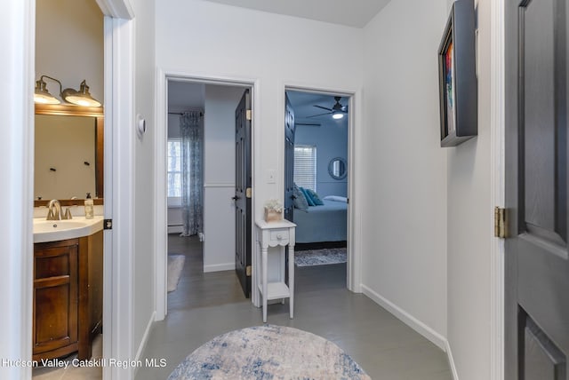 hallway featuring sink