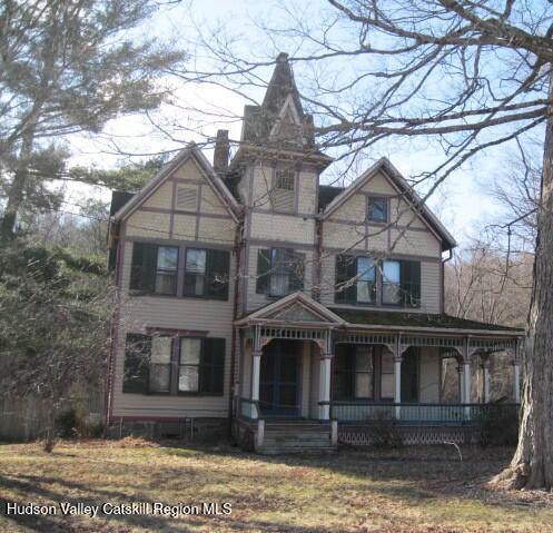1896 County Rte 9, Chatham, NY 12037 - view of front of house featuring covered porch and a chimney